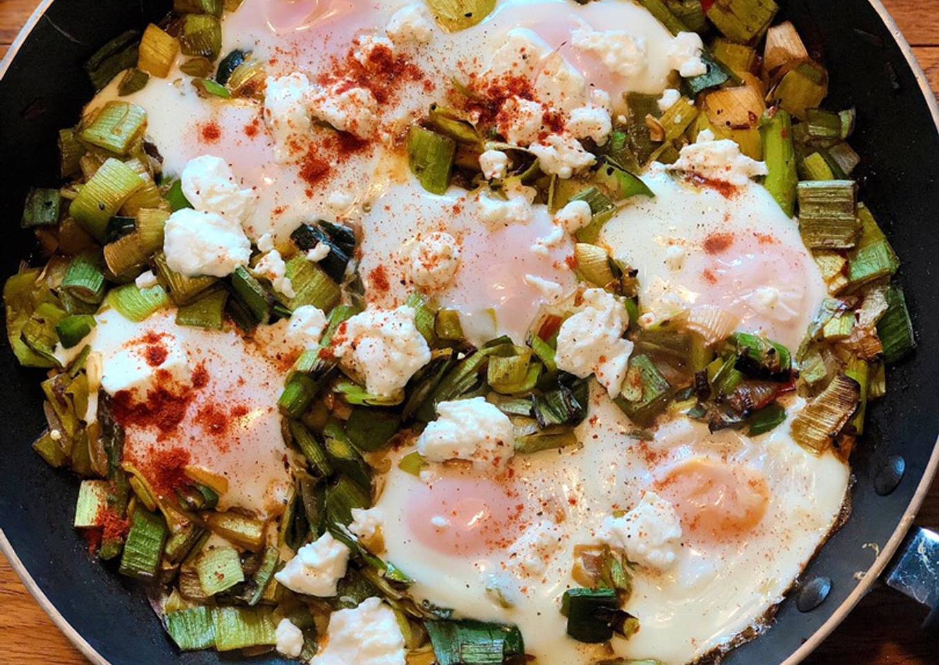 Baked eggs with spiced leeks and goats cheese