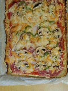 Una foto de Pizza con masa de coliflor