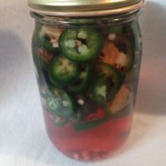 A picture of Fresh Pickled Jalapeno and Serrano Peppers.