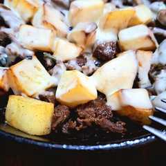 A picture of Carnita con cebollín a la sartén.
