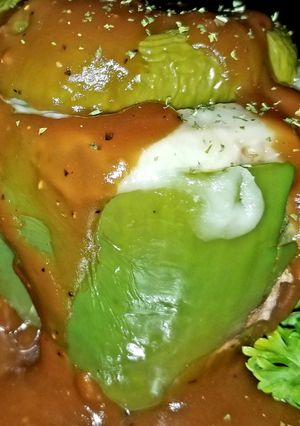 A picture of Mike's Stuffed Cheesy Meaty Bell Peppers With Gravy.