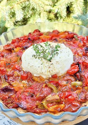 Une photo de Tarte aux tomates confites et chèvre frais