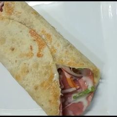 A picture of Tortilla pepperoni 🍕 Vegetables wrap.