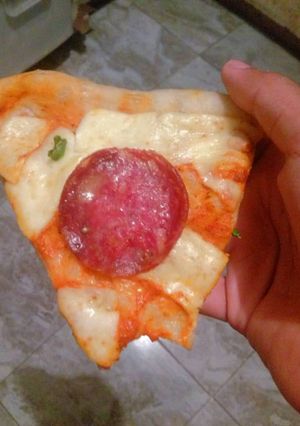 Una foto de Pizza clásica