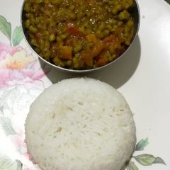 A picture of Carrot moong sabji with rice.