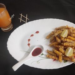 A picture of Crispy Corn Masala Sticks.
