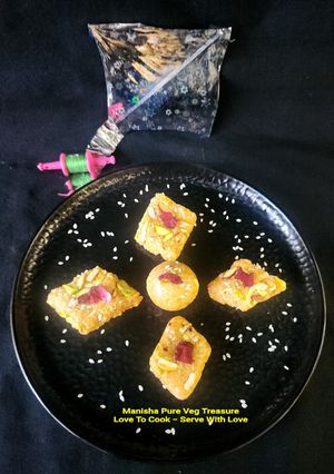 A picture of Sesame Peanuts Jaggery Gajak - Til Moongfali Gud Burfi.