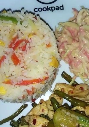 A picture of French beans chicken and veg fried rice.