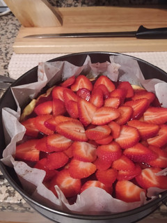 Una foto de Tarta de queso con fresas