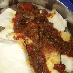 Boiled yam and sauce A picture of Boiled yam and sauce.