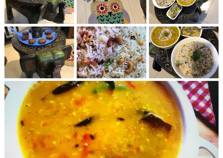 Coconut Rice Yellow Moong Dal with Coconut Coconut Pakoras and Coconut Posto Paste Baata