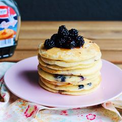 A picture of Pancakes with blueberries.