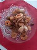 Mariscada y filet al ajillo, con repollitos de Bruselas al horno