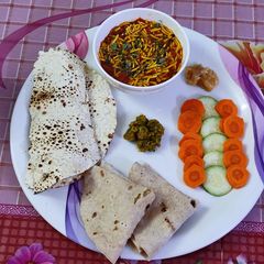 A picture of Sev Tameta nu Shak - 10 minutes Gujarati dinner sabji (with roti).