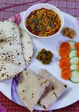 A picture of Sev Tameta nu Shak - 10 minutes Gujarati dinner sabji (with roti).