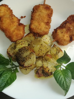 Una foto de Brochetas de solomillo de cerdo con queso rebozado