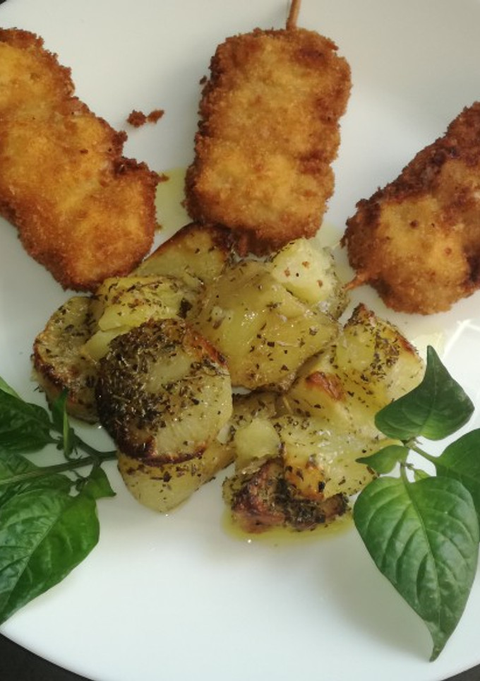 Una foto de Brochetas de solomillo de cerdo con queso rebozado