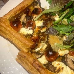 A picture of Goats cheese and red onion tart.