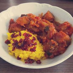 A picture of Aubergine Sauce with Saffron Rice.