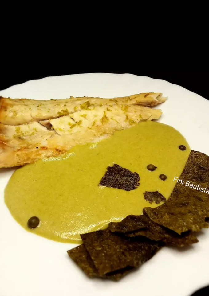 Una foto de Lubina en salsa de pimienta verde