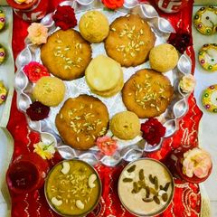 A picture of #Besan Ladoos,besan jaggery Sheera,Mewa  kheer,jaggery Mathri.