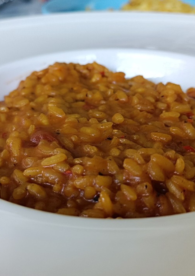 Una foto de Arroz cremoso de sepia y langostinos