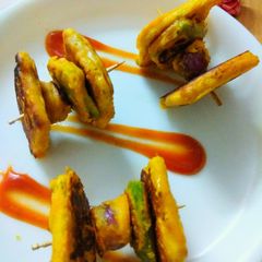 A picture of Biscuits Tikka.