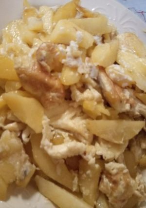 A picture of Fried potato with egg.