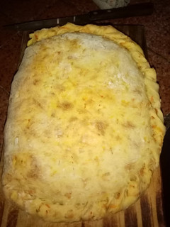 Una foto de Tarta de choclo, cebolla y muzzarella