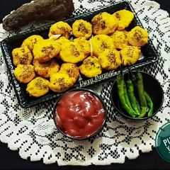 A picture of Ratalu Puri (Purple Yam Puri).