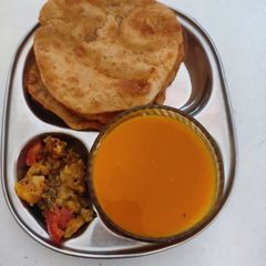 A picture of Aamras puri.