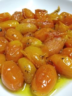Una foto de Tomatitos cherry confitados