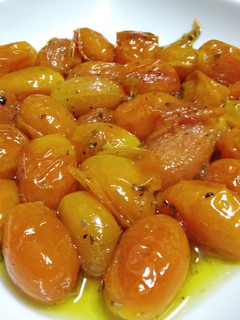 Una foto de Tomatitos cherry confitados