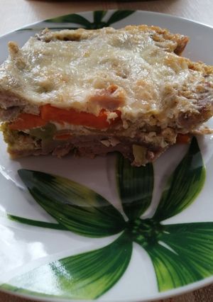 Sajtos, tejszínes rakott karaj recept fotója