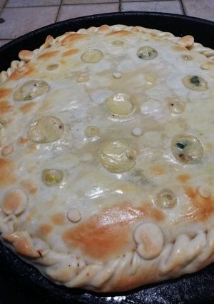 Una foto de Tarta de puerros y cebollas blancas. #platounico