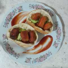 Una foto de Cestica de palmitos de cangrejo apanados