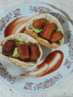Una foto de Cestica de palmitos de cangrejo apanados
