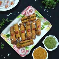 A picture of Bharli Shevgyachya Shenganchi Bhaji (Stuffed Drumstick Fritters).