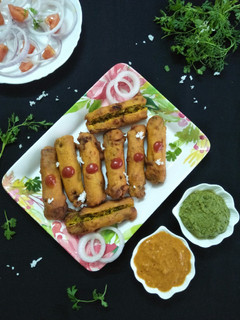 A picture of Bharli Shevgyachya Shenganchi Bhaji (Stuffed Drumstick Fritters).