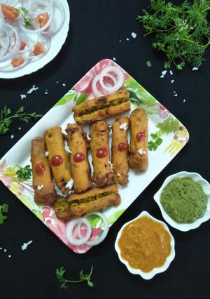 A picture of Bharli Shevgyachya Shenganchi Bhaji (Stuffed Drumstick Fritters).