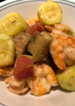 A picture of Roasted Cajun Eggplant, 🍆, Shrimp 🍤 and Zucchini.