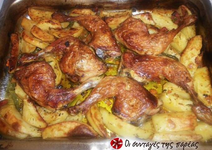 κύρια φωτογραφία συνταγής Ζουμερά μπουτάκια κοτόπουλου με πατάτες φούρνου