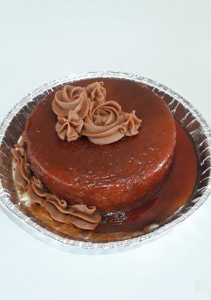 Una foto de Budín de pan 😋😊