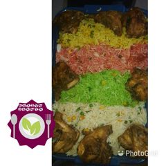 A picture of White,green,pink,yellow rice.