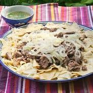 A picture of Beshbarmak (boiled meat with noodles) (Kazakhstan).