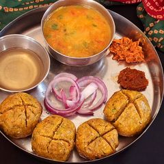 A picture of Makki flour masala bafla Bati.