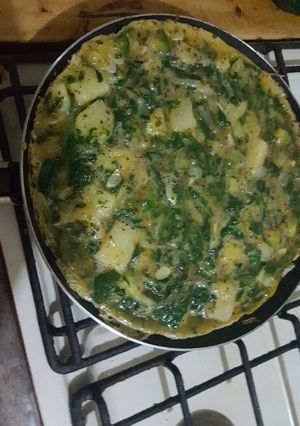 Una foto de Tortilla de papa, acelga y zapallito verde