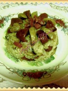 Una foto de Arroz blanco con champiñones y jamón