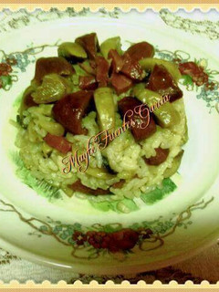 Una foto de Arroz blanco con champiñones y jamón