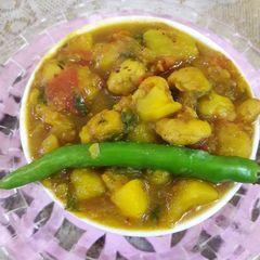 A picture of Aloo makhana jhol.